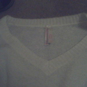 Ivory V-Neck Sweater is being swapped online for free