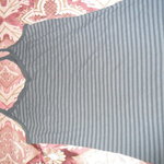 Black and grey tank size:xl 15/17 is being swapped online for free