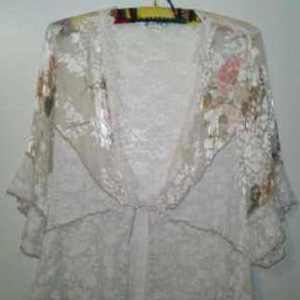 BEAUTIFUL SHEER FLORAL LACE TOP is being swapped online for free