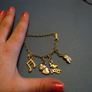 Charm Bracelet w/4 charms is being swapped online for free