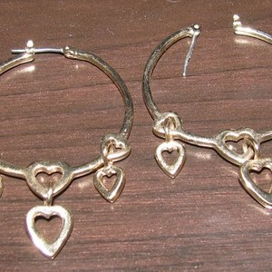 Gold Heart Hoop Earrings  is being swapped online for free