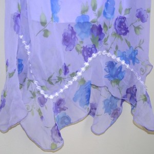 Pretty Purple Asymm Dress  is being swapped online for free