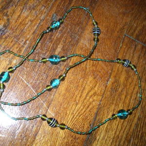 teal bead necklace is being swapped online for free