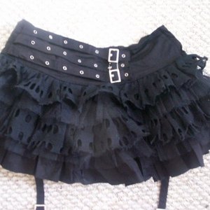 Goth mini skirt w legwarmers is being swapped online for free