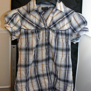 Blue & Brown Plaid Shortsleeve is being swapped online for free