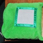 green bean bag picture frame is being swapped online for free