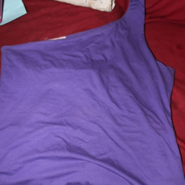 purple one shoulder shirt sz l is being swapped online for free