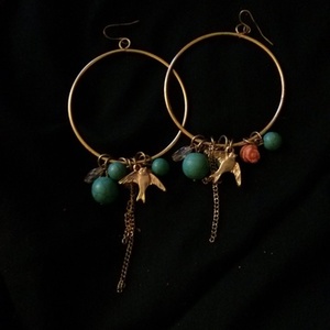 dangling hoop earings is being swapped online for free