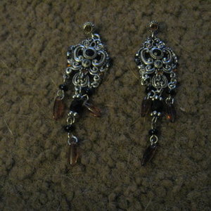 black and silver earrings is being swapped online for free