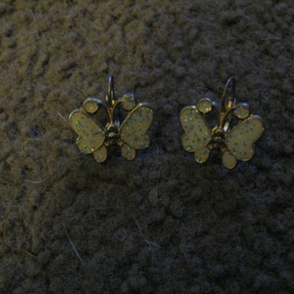 gold and cream butterfly earrings is being swapped online for free