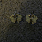 gold and cream butterfly earrings is being swapped online for free