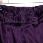 NWOT Purple Satin Bow Skirt is being swapped online for free