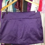 shiny purple mini skirt is being swapped online for free