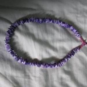 purple puka shell necklace is being swapped online for free