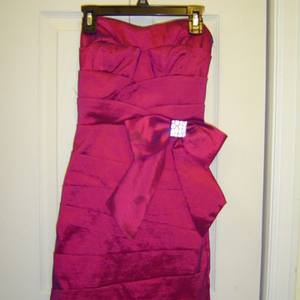 Beautiful Magenta Pencil Cut Dress is being swapped online for free