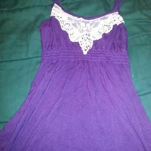 Purple and white lace tank top is being swapped online for free