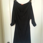 Black dress with gold accents M is being swapped online for free