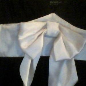 Black and white dress with bow is being swapped online for free