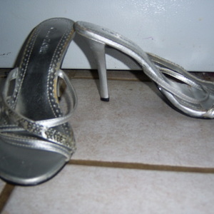 5.5 to 6 silver straps HEELS  is being swapped online for free