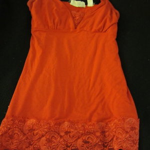 Red guess lace cami is being swapped online for free