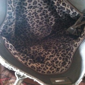 Buckle Brand lace and silver purse is being swapped online for free