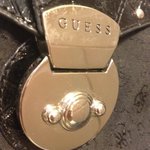 Guess purse  is being swapped online for free