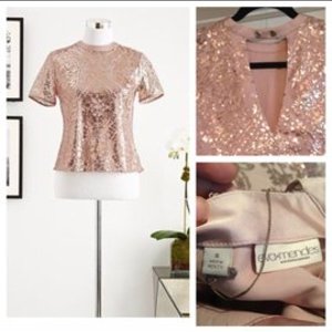 NWOT Eva Mendes top size Small is being swapped online for free