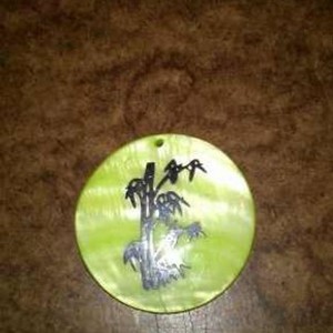 NEW GREEN BAMBOO DESIGN ROUND PENDANT is being swapped online for free