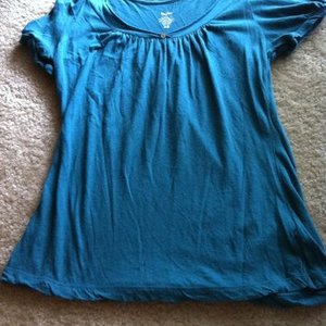 teal flowy top is being swapped online for free