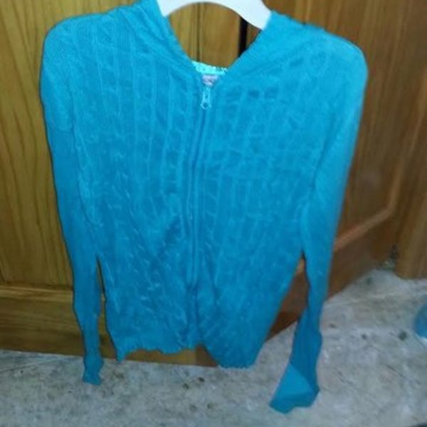 Teal Cable Knit Sweater is being swapped online for free