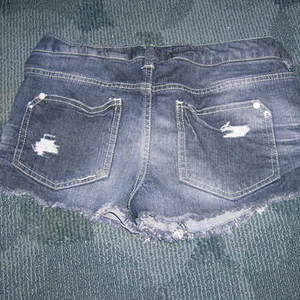 Destroyed Drk Denim Shorts is being swapped online for free