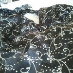 XL Sparkly Silver Swirl black cami is being swapped online for free