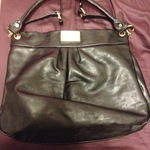 Faux Black Marc Jacobs Satchel with Gold Detail is being swapped online for free