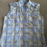 Sleevless western button up szL is being swapped online for free
