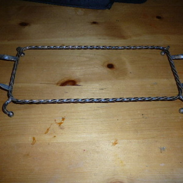 Metal tray holder is being swapped online for free