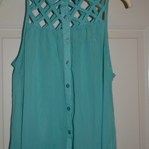 Turquoise Caged Top is being swapped online for free