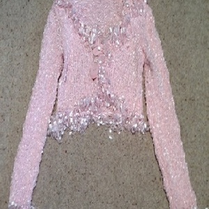 Pink Ruffle Collar Shrug - size 12.  is being swapped online for free