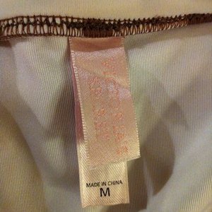 Victoria's Secret Polka Dot Halter/ Strapless Swimsuit L Top, M Bottoms is being swapped online for free