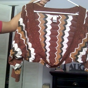 multi colored shrug is being swapped online for free