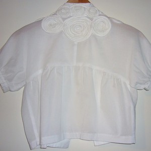BCBG rosette bolero/jacket, sz XS is being swapped online for free