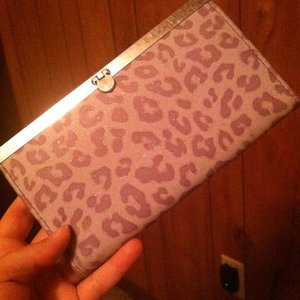 Purple Leopard Print Wallet   is being swapped online for free