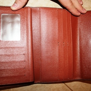 LV replica wallet  is being swapped online for free