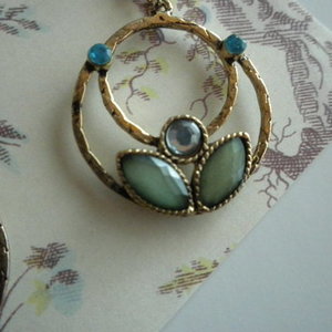 green and gold earrings is being swapped online for free
