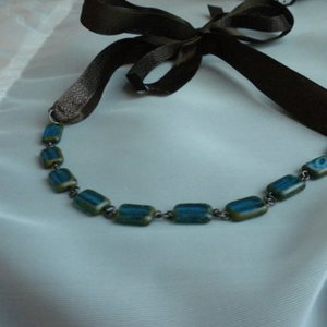 brown ribbon necklace is being swapped online for free