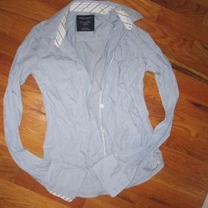 American Eagle Light Blue Tailored Shirt Size 0 is being swapped online for free