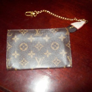 LV coin purse. is being swapped online for free