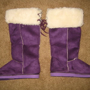 Purple LIKE-UGGS lace up back knee high  is being swapped online for free
