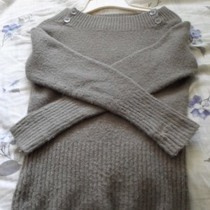 Olive wool sweater m is being swapped online for free