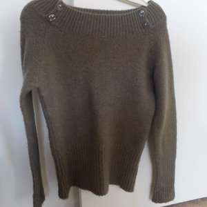 Olive wool sweater m is being swapped online for free