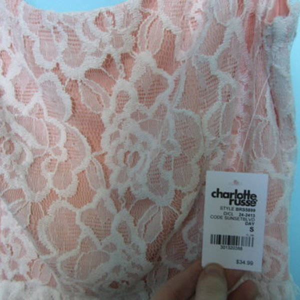 white lacey dress is being swapped online for free
